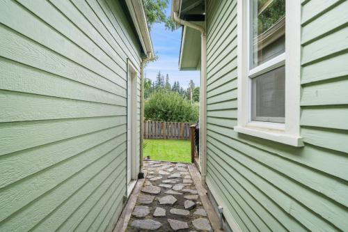 a side view of a house with a window at Geneva Retreat in Bellingham