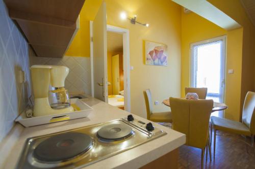 a kitchen with a counter with a blender on it at Villa Neda in Makarska