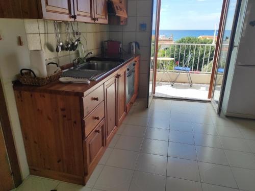 A kitchen or kitchenette at Casa Terrasini