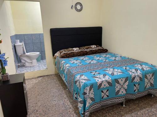 Кровать или кровати в номере Hotel Posada de Don Chusito