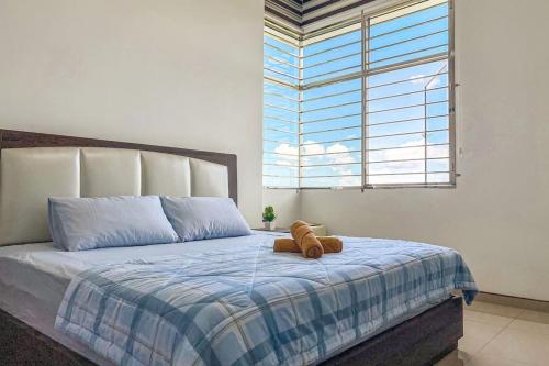 Ліжко або ліжка в номері Taiping Homestay near Lake Garden with Sunset View