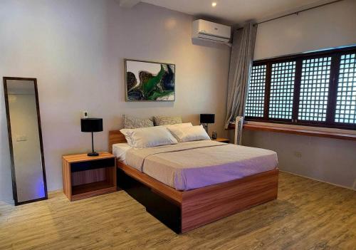 Katil atau katil-katil dalam bilik di Royal Seascape 1 Beachfront