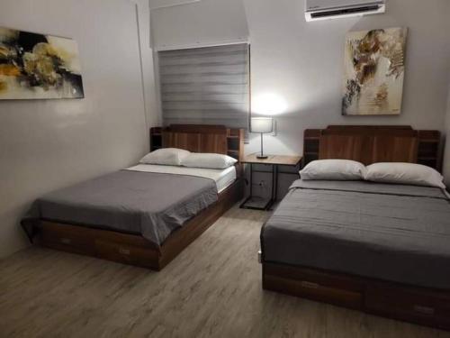 Katil atau katil-katil dalam bilik di Royal Seascape 1 Beachfront