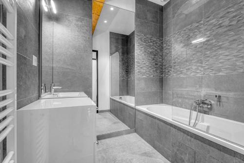 Ванная комната в Rosario - Joli T3 climatisé dans Toulouse