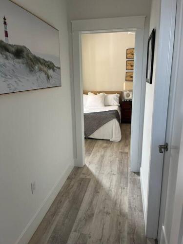Кровать или кровати в номере Bela Vista Getaway - PEI Tourism License #1201185