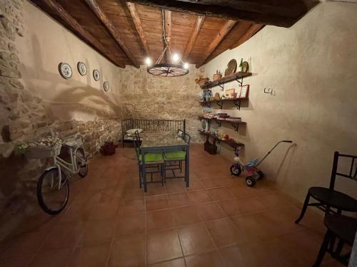 a room with a table and some chairs in it at Casa Lidia - Antigua Posada Real in Valderrobres