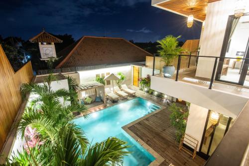 an overhead view of a swimming pool in a villa at Zayana Villas Resort Seminyak in Seminyak