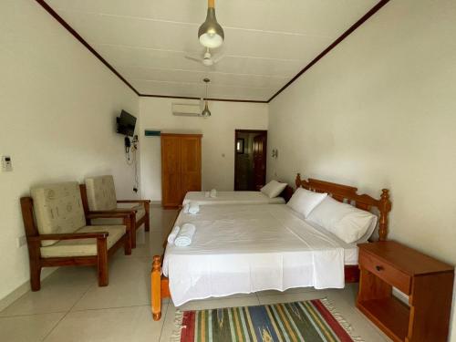 Voodi või voodid majutusasutuse Bethel's Villas toas