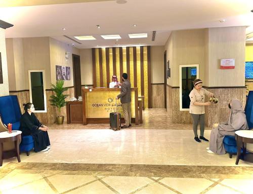 a group of people standing in a lobby at Ocean View Al Zahra in Jeddah