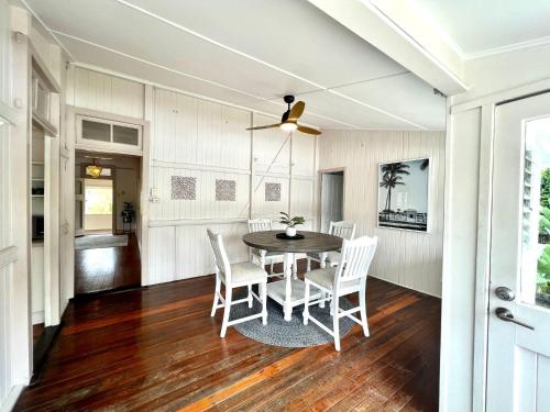 a dining room with a table and chairs at Sturges Street 22 - Unit 1 in Aitkenvale
