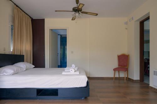 Postel nebo postele na pokoji v ubytování Green House Marathon - Greece