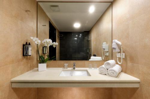 A bathroom at Aphrodite Hotel