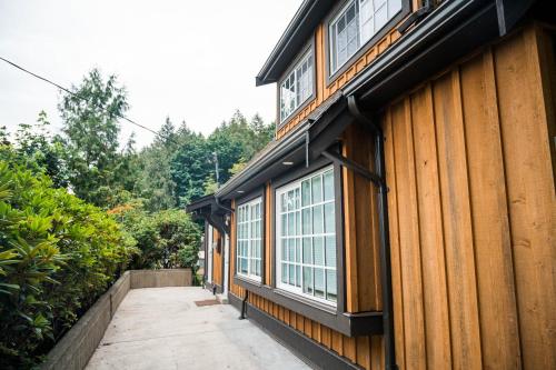 a building with windows on the side of it at Private Mountainside Home in Chilliwack