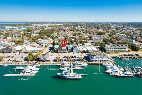 an aerial view of a marina with boats in the water at Why Knot Getaway...Rooftop with WaterView! Unit D in Beaufort