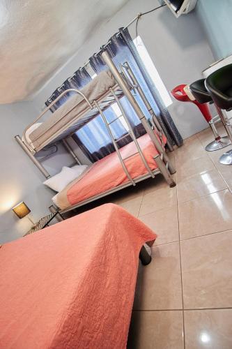 Ένα ή περισσότερα κρεβάτια σε δωμάτιο στο Hotel Casa Ceci Inn