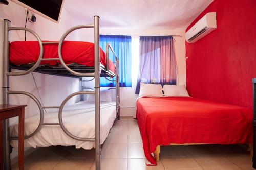 Ένα ή περισσότερα κρεβάτια σε δωμάτιο στο Hotel Casa Ceci Inn