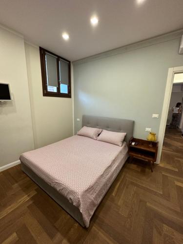 Postel nebo postele na pokoji v ubytování San Domenico Apartment