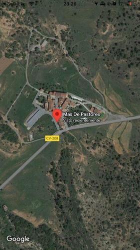 a map of a us do border with a red dot at Oasis rural in Los Pastores