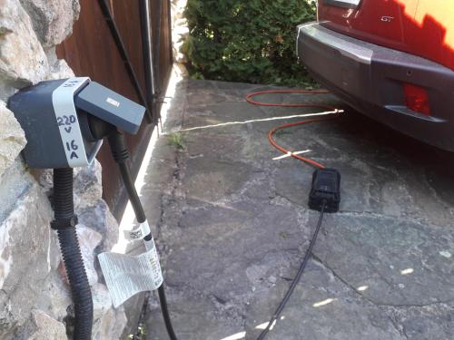 a car charger is hooked up to a house at Stavne 158 in Stavnoye