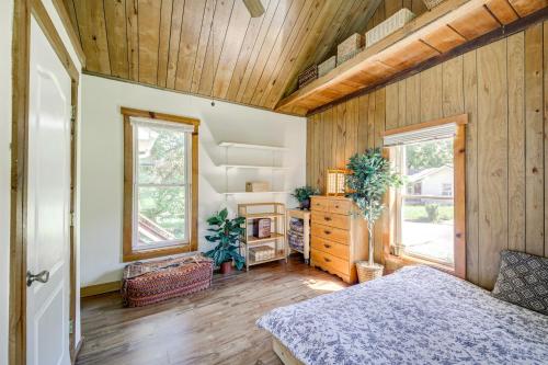 a bedroom with a bed and a wooden ceiling at Bloomington Home Rental Near Attractions and IU! in Bloomington