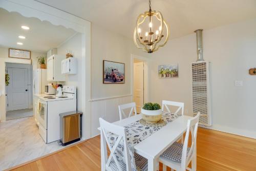 a kitchen and dining room with a table and chairs at Historic Home 3 Blocks to Whiskey Row and Downtown in Prescott