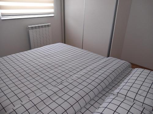 Katil atau katil-katil dalam bilik di Stan na dan-Apartman N&T2