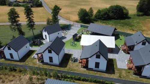 an overhead view of a bunch of houses at Łap chwilę Ostrowo in Ostrowo