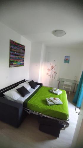 Postel nebo postele na pokoji v ubytování Sweet Riva Home