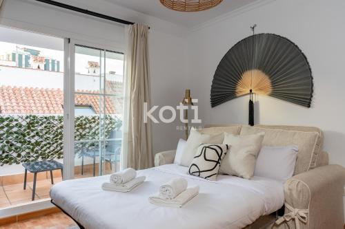 Posteľ alebo postele v izbe v ubytovaní Koti Rentals - Sandy Beach Apartment