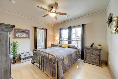 a bedroom with a bed and a ceiling fan at Less Than 1 Mi to Dtwn Home with Deck in Clarkdale! in Clarkdale