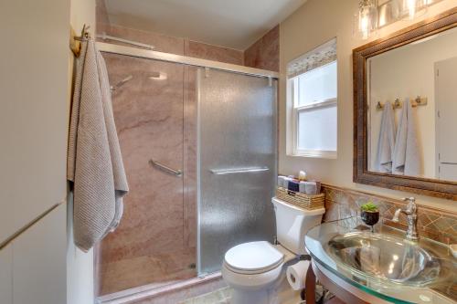 a bathroom with a shower and a toilet and a sink at Charming Clarkdale Home - Half Mi to Downtown! in Clarkdale