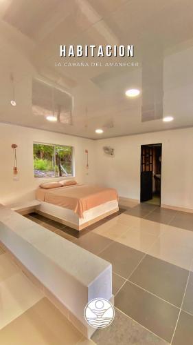 a bedroom with a bed and a sign on the wall at Cabaña Privada o Casa Privada Tana in Prado