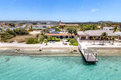 an aerial view of a house on the water at Oceanfront - Villa Port of Call - in Kralendijk