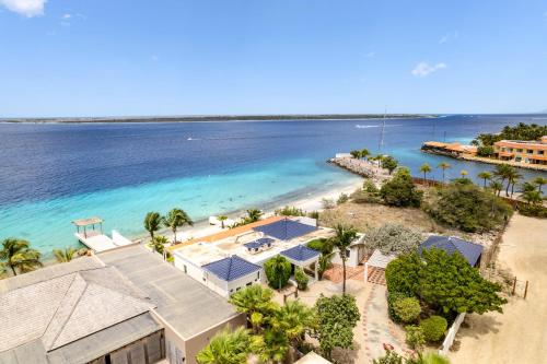 an aerial view of the beach and the ocean at Oceanfront - Villa Port of Call - in Kralendijk
