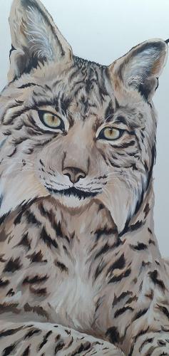 a painting of a cat with yellow eyes at Три горішки in Yaremche