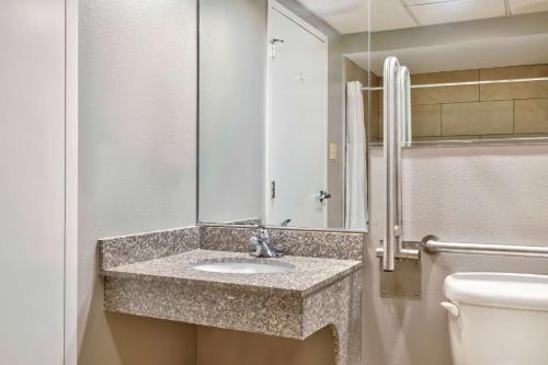 a bathroom with a sink and a toilet at Motel 6 Bethel, CT - Danbury in Bethel