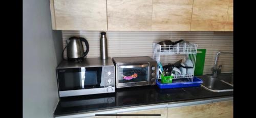 Η κουζίνα ή μικρή κουζίνα στο Cozy Umalas Guesthouse