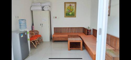 Un lugar para sentarse en Cozy Umalas Guesthouse