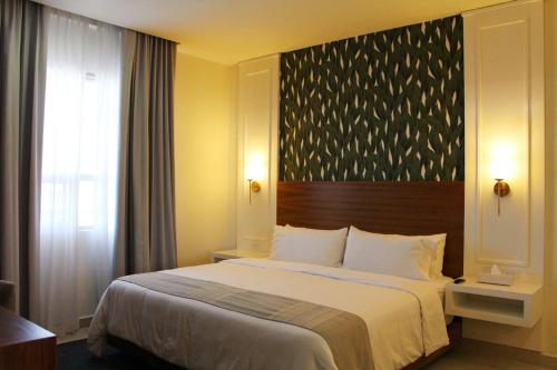 Postel nebo postele na pokoji v ubytování Casa Maria Boutique Hotel