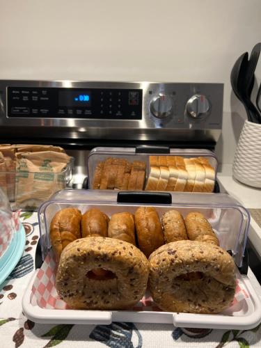 a tray of donuts and pastries in an oven at The View suites and breakfast in Triton, Newfoundland in Pilleyʼs Island