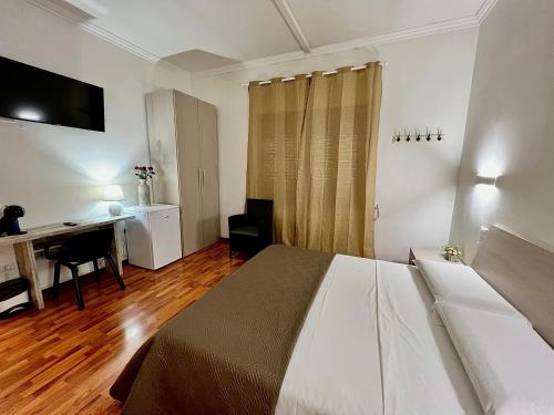Postel nebo postele na pokoji v ubytování Venice Suites