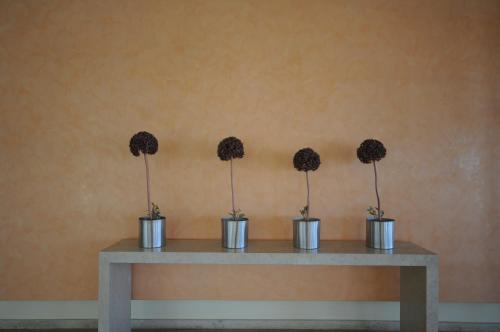 a table with fourousandousandousandousandousandousandousandousandousandousandousandousand at Paliria Hotel in Chalkida