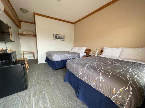 Katil atau katil-katil dalam bilik di Bear's Claw Lodge