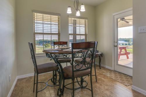 a dining room with a table and chairs at about 10 Mi to Dtwn McKinney Home with Patio and Yard in McKinney