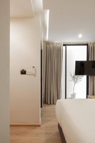 Postel nebo postele na pokoji v ubytování Double B Hostel