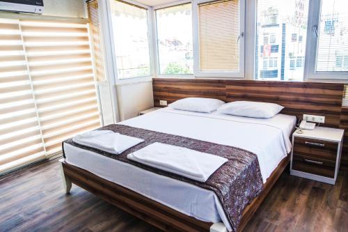 Katil atau katil-katil dalam bilik di Ale Park Hotel Apartments