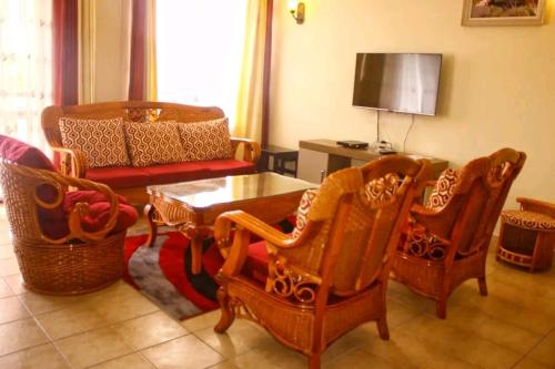 Area soggiorno di Lux Suites Impala Apartments Nyali