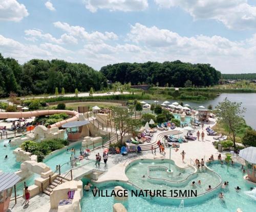 an image of a water park at a resort at appartement 2 pièces 5min gare val d'Europe parking inclus in Montévrain