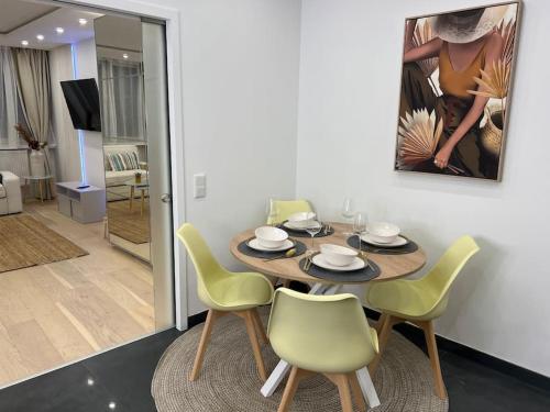 a dining room with a table and chairs at Welcome on Board in Nürnberg