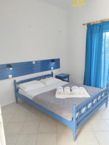 Ένα ή περισσότερα κρεβάτια σε δωμάτιο στο VILLA AGIA AIKATERINI